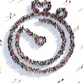 people arrange in the shape of a stopwatch